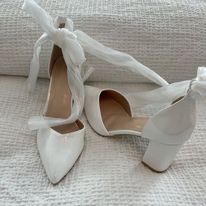 White patent leather lace up heels